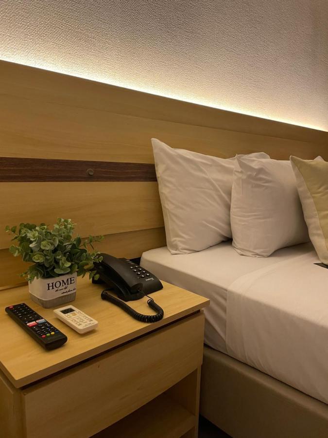Flat Praia Home Experience Dante Michelini Vitoria Bagian luar foto